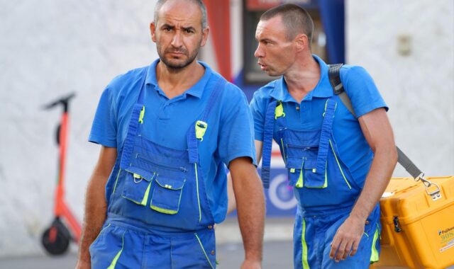 workers, men, blue uniform, blue clothes, work uniforms, tool box, walking, street, workers, workers, workers, workers, workers, blue uniform, work uniforms, work uniforms, work uniforms, tool box, tool box, tool box, tool box, tool box
