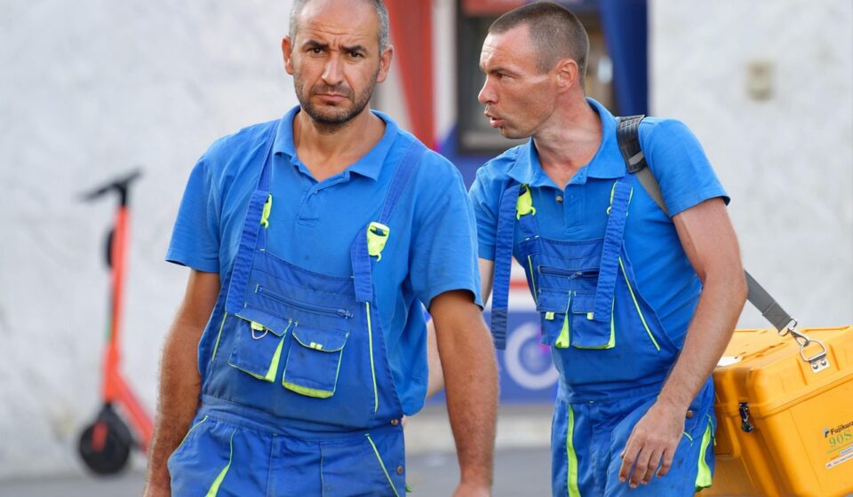 workers, men, blue uniform, blue clothes, work uniforms, tool box, walking, street, workers, workers, workers, workers, workers, blue uniform, work uniforms, work uniforms, work uniforms, tool box, tool box, tool box, tool box, tool box