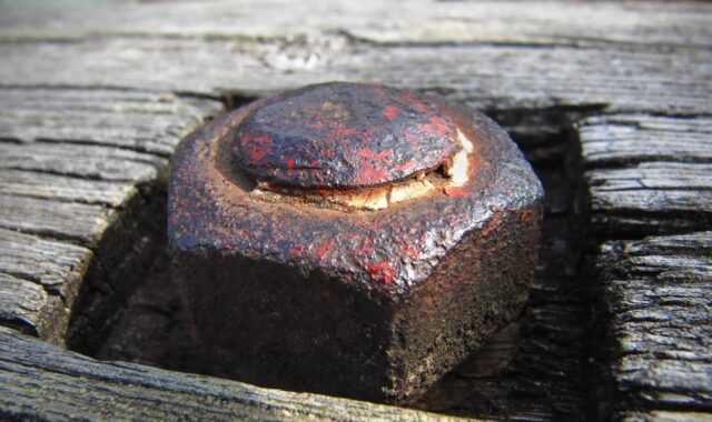 screw nut, nut, iron, screwed, old, rusty, rusted, aged, fastener, bolt, corrosion, hole, metal, rust, wooden, wood, hexagonal, outdoor, oxidation, one, macro, close, square, slot, socket, shape, cracked paint, tight, stable, fastened, firm, threaded, crannied, cracks, stains, corrosible, stiff, sturdy, hardware, construction, inserted, big, exterior, detail, hold, hexagon, metallic, gray construction, gray painting, gray paint, gray metal, rusty, oxidation, oxidation, oxidation, oxidation, oxidation, firm, firm, firm